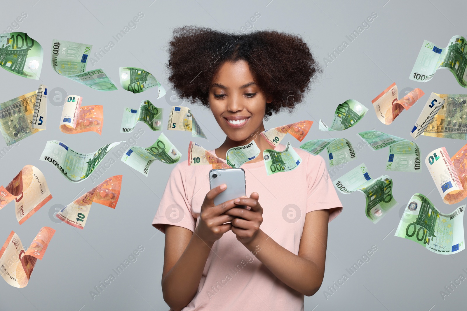 Image of Online payment. Woman buying something using mobile phone on light grey background. Euro banknotes flying out of gadget demonstrating process of money transaction