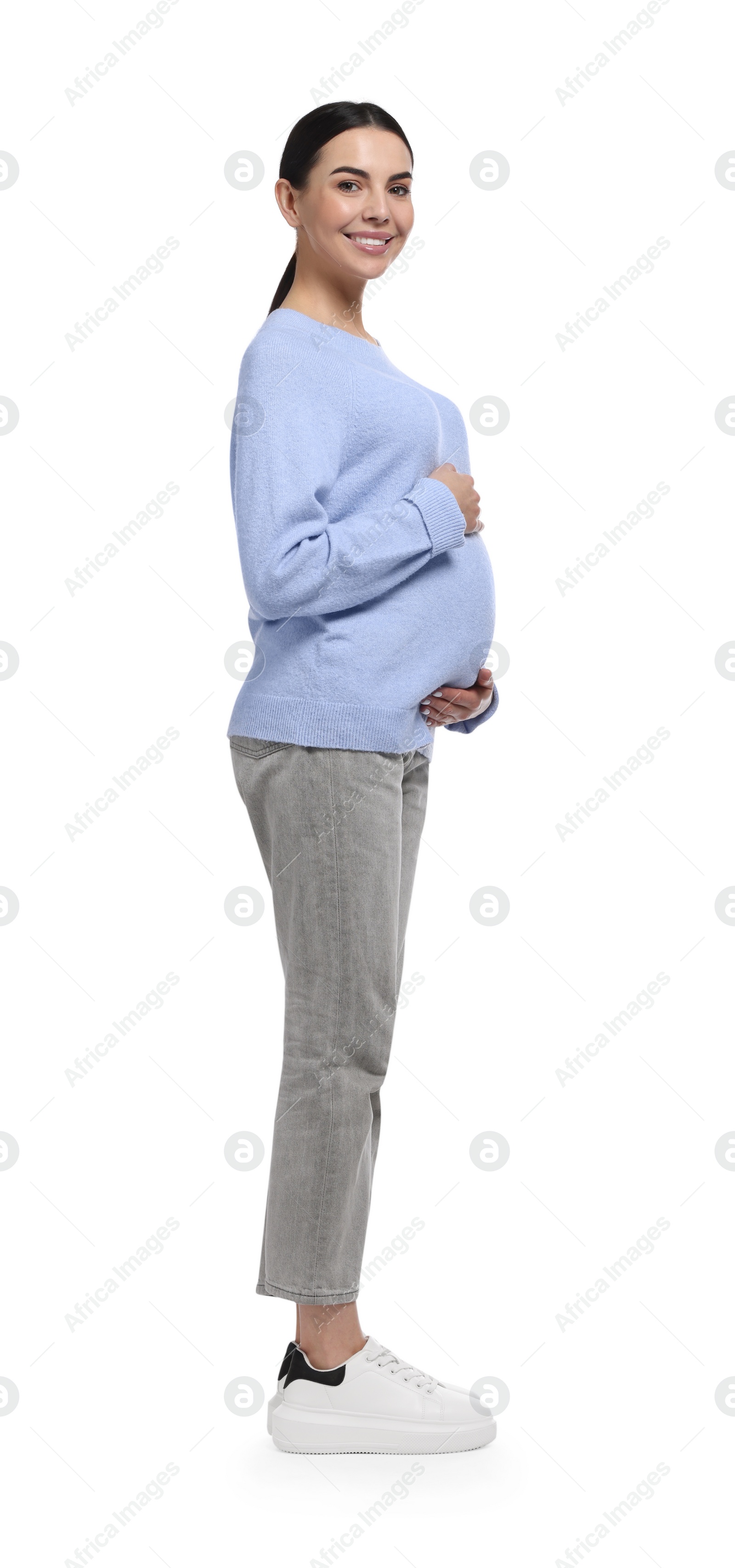 Photo of Beautiful happy pregnant woman isolated on white