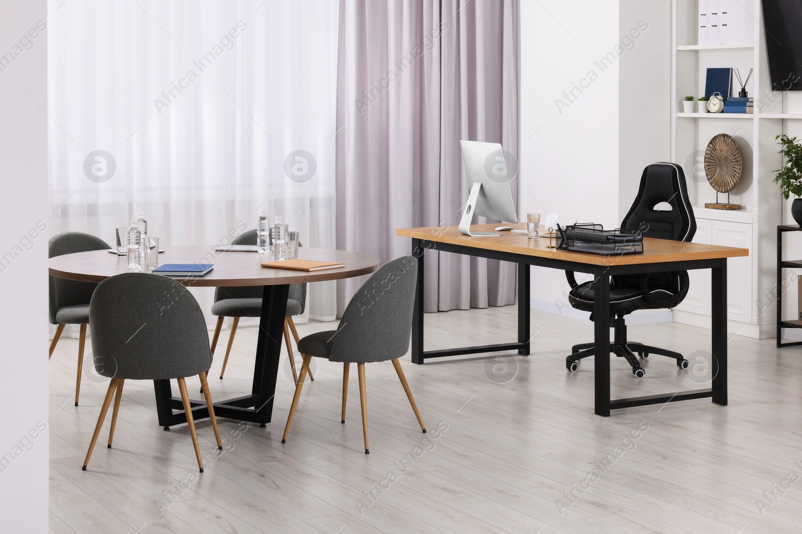 Photo of Stylish office with comfortable furniture. Interior design