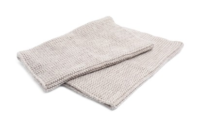 One beige knitted scarf on white background