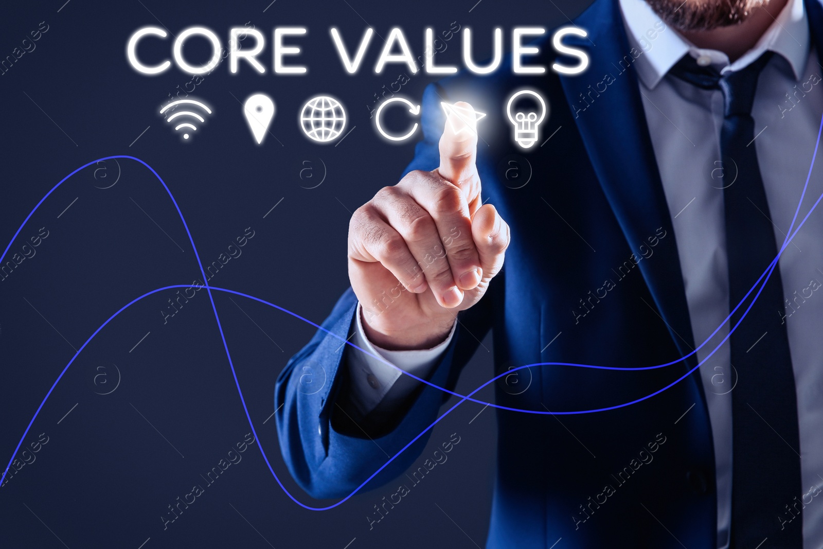 Image of Core values concept. Businessman pointing at icon on virtual screen