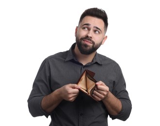 Photo of Man showing empty wallet on white background