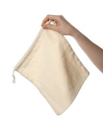 Photo of Woman holding eco friendly cotton bag on white background, closeup. Conscious consumption
