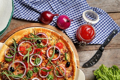 Photo of Flat lay composition with tasty homemade pizza on table