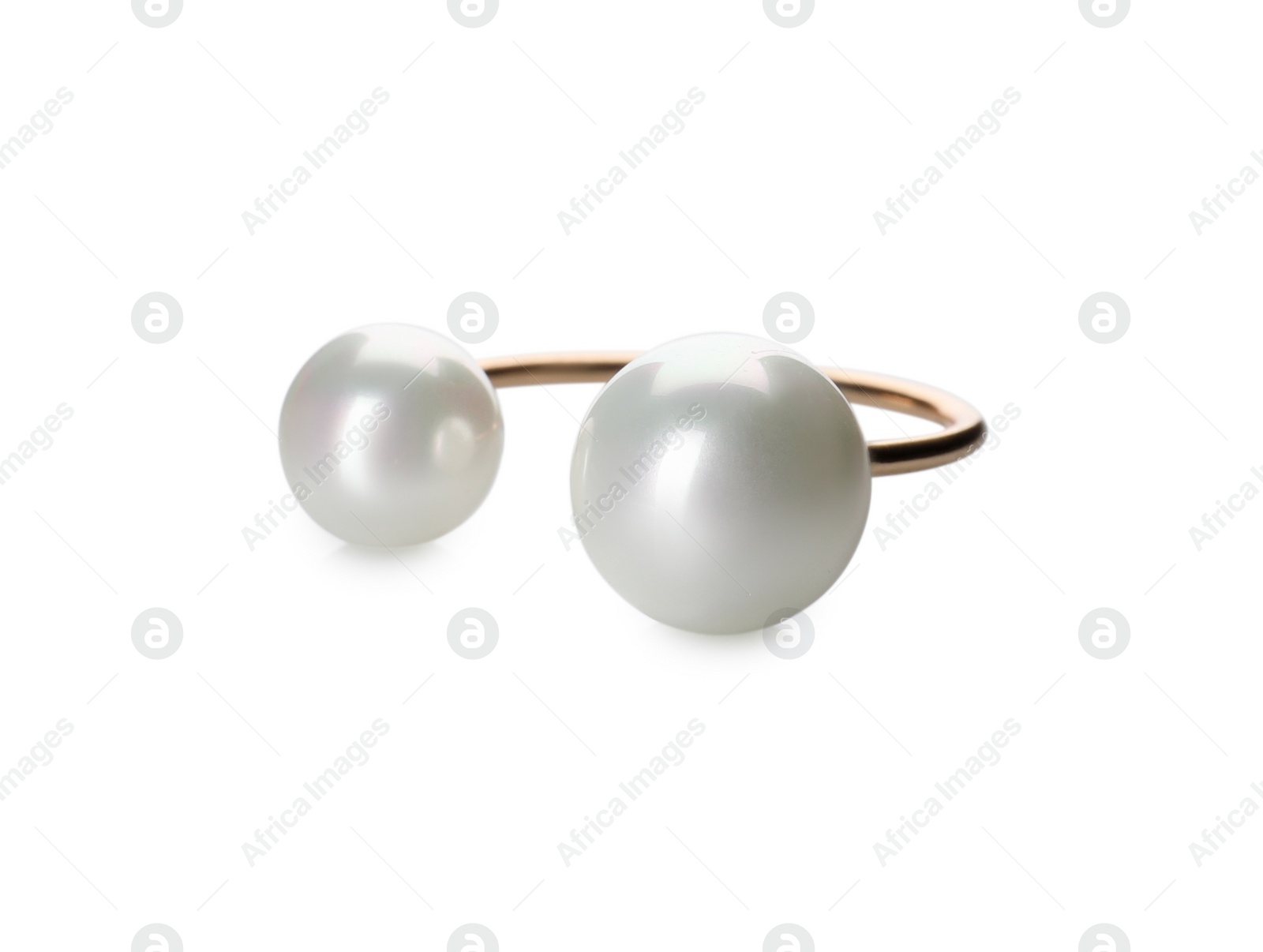 Photo of Elegant golden ring with pearls isolated on white