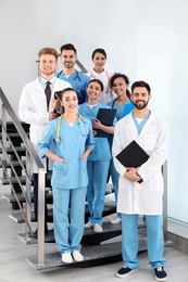 Photo of Team of medical workers in hospital. Unity concept