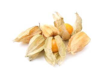 Many ripe physalis fruits with calyxes isolated on white