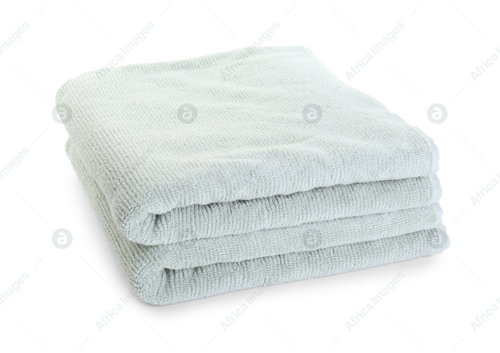 Photo of Soft folded terry towels isolated on white