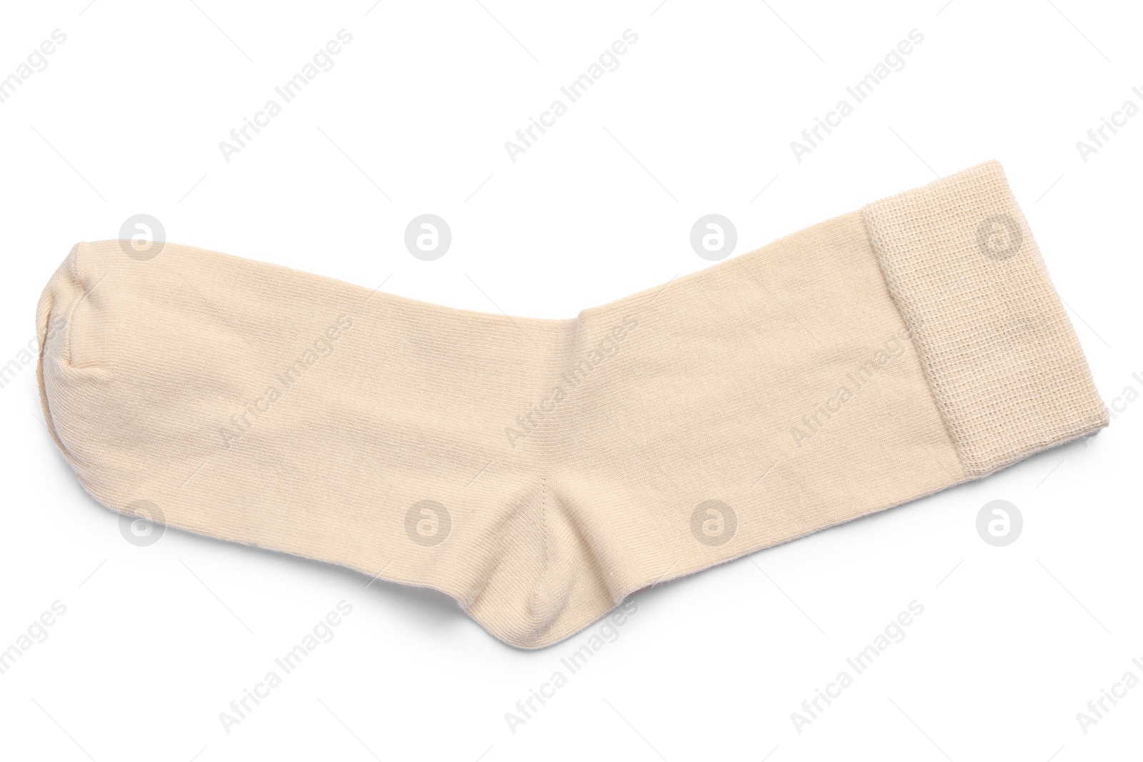 Photo of New beige sock isolated on white, top view