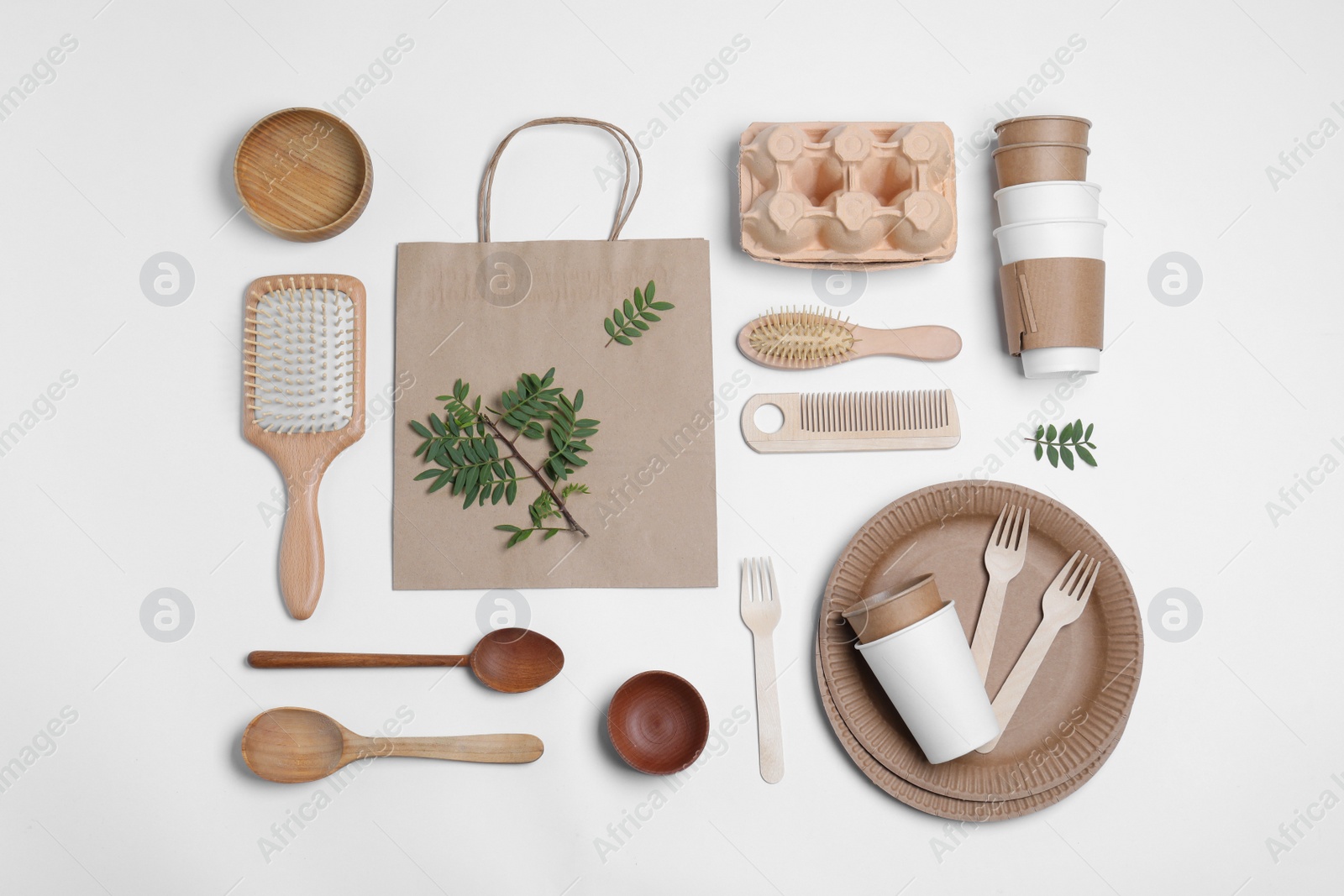 Photo of Different eco items on white background, flat lay. Recycling concept