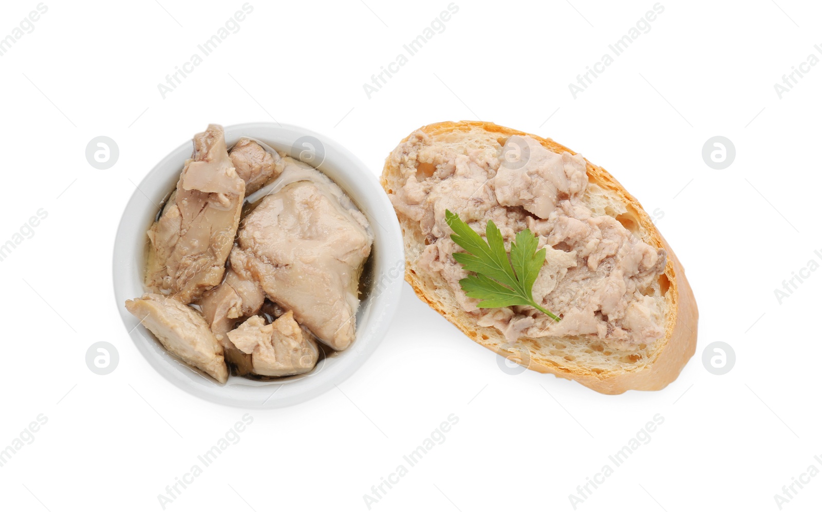 Photo of Tasty sandwich with cod liver and fresh parsley isolated on white, top view