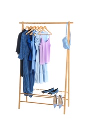 Photo of New wardrobe rack with stylish lady's clothes and shoes on white background