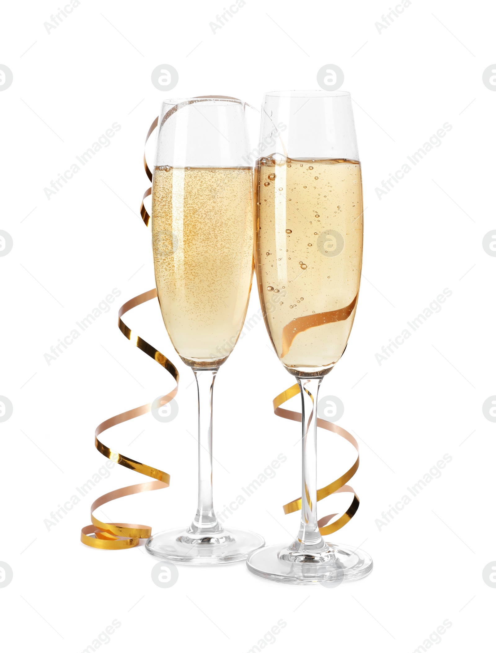 Photo of Glasses of champagne on white background. Festive drink