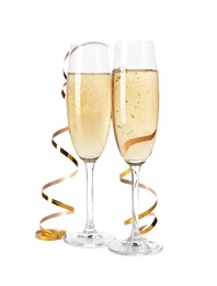 Glasses of champagne on white background. Festive drink