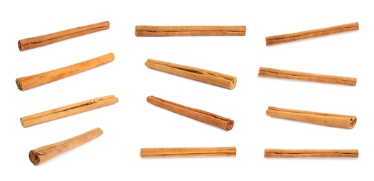 Image of Set with aromatic cinnamon sticks on white background, banner design