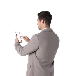 Photo of Man using smartphone with blank screen on white background, back view