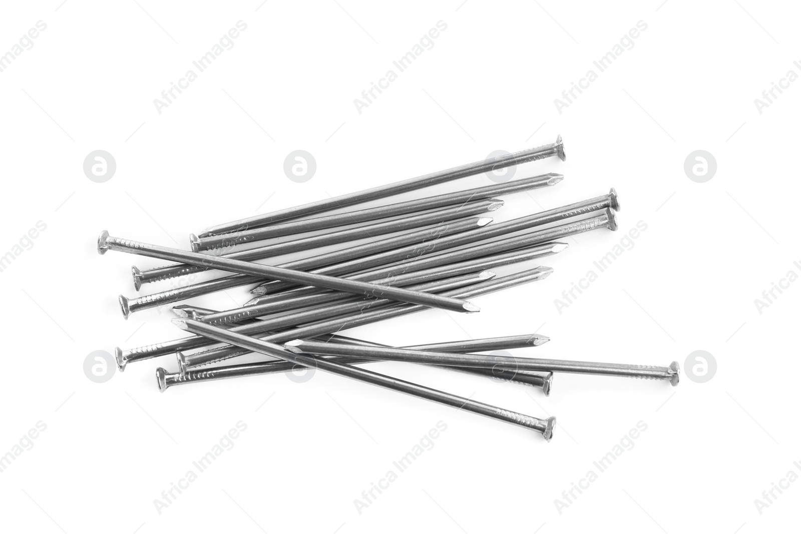 Photo of Pile of metal nails on white background, top view