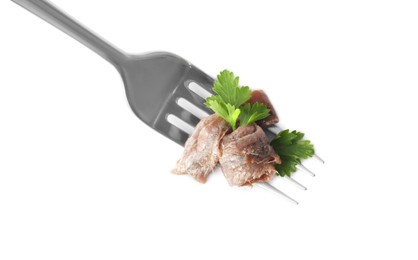 Photo of Fork with delicious anchovy fillet and parsley isolated on white, top view