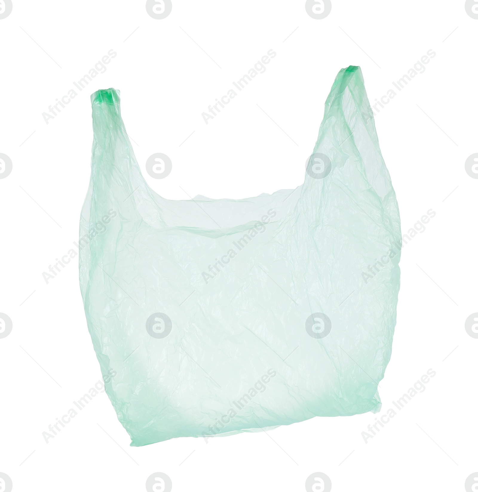 Photo of One light green plastic bag isolated on white