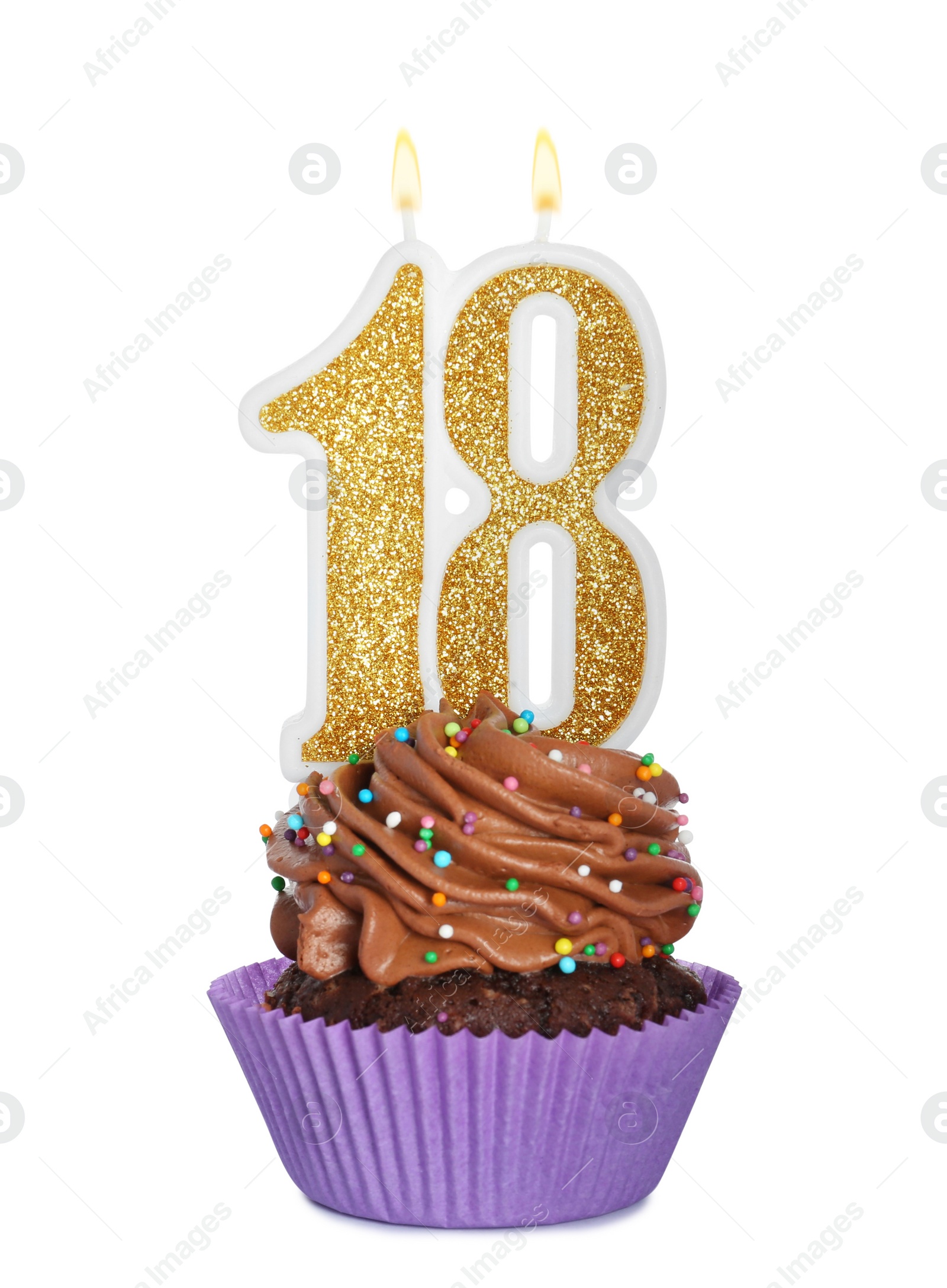 Photo of 18th birthday. Delicious cupcake with number shaped candles for coming of age party on white background