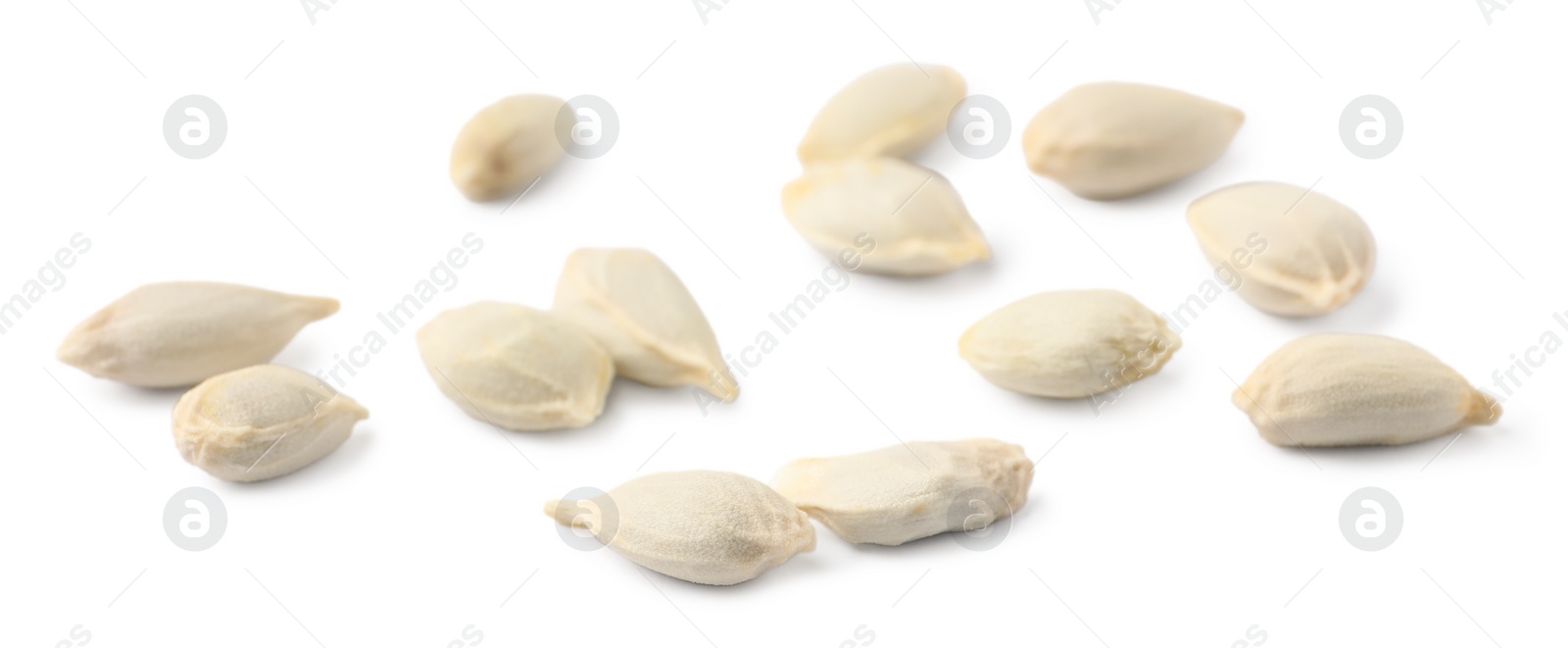 Photo of Many seeds of tangerine isolated on white