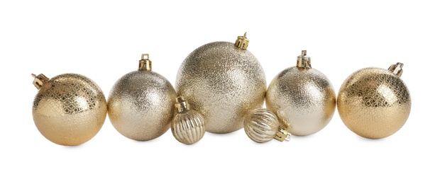 Photo of Set of beautiful shiny Christmas balls on white background