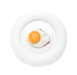 Photo of Plate with delicious fried egg isolated on white, top view