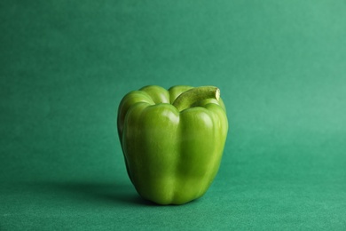 Photo of Raw ripe paprika pepper on color background