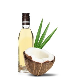 Image of Bottle of coconut cooking oil and fruit on white background