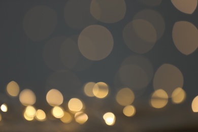 Photo of Beautiful lights on dark background. Bokeh effect