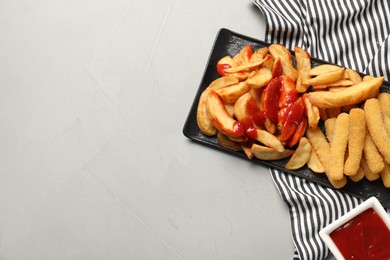 Photo of Delicious baked potato and cheese sticks with ketchup on light grey table, flat lay. Space for text