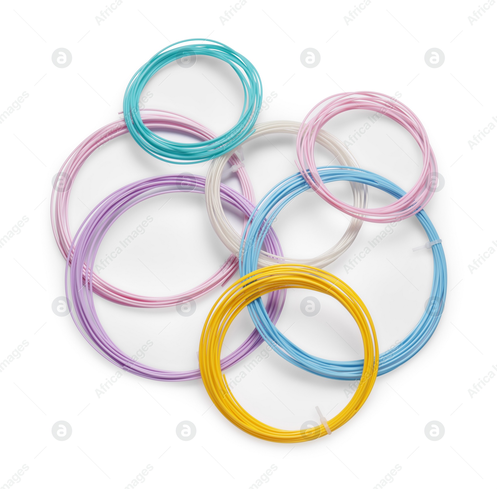 Photo of Colorful plastic filaments for 3D pen isolated on white, top view