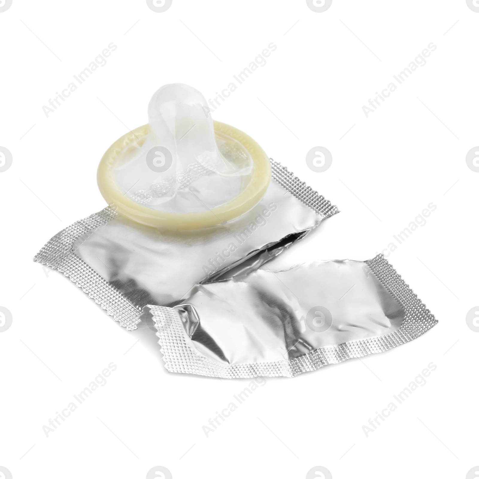 Photo of Torn package with condom isolated on white. Safe sex