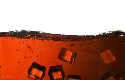 Closeup view of tasty refreshing cola with ice cubes on white background