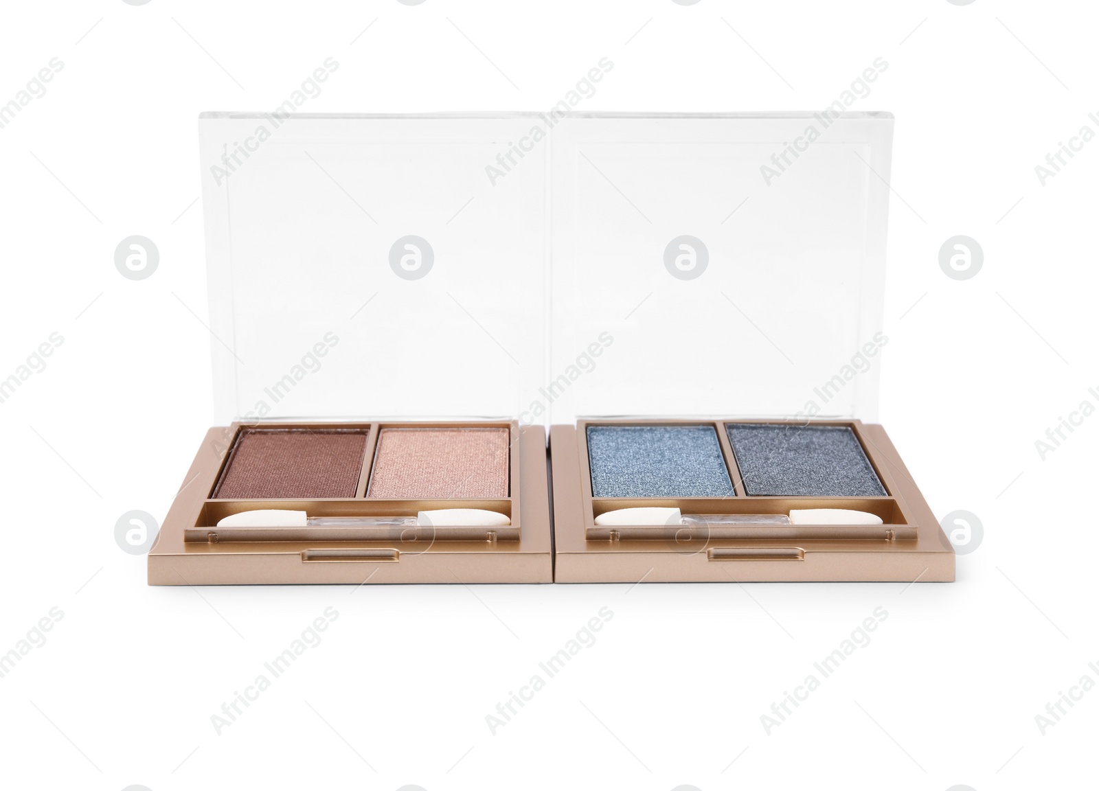 Photo of Beautiful eye shadow palettes with brushes isolated on white