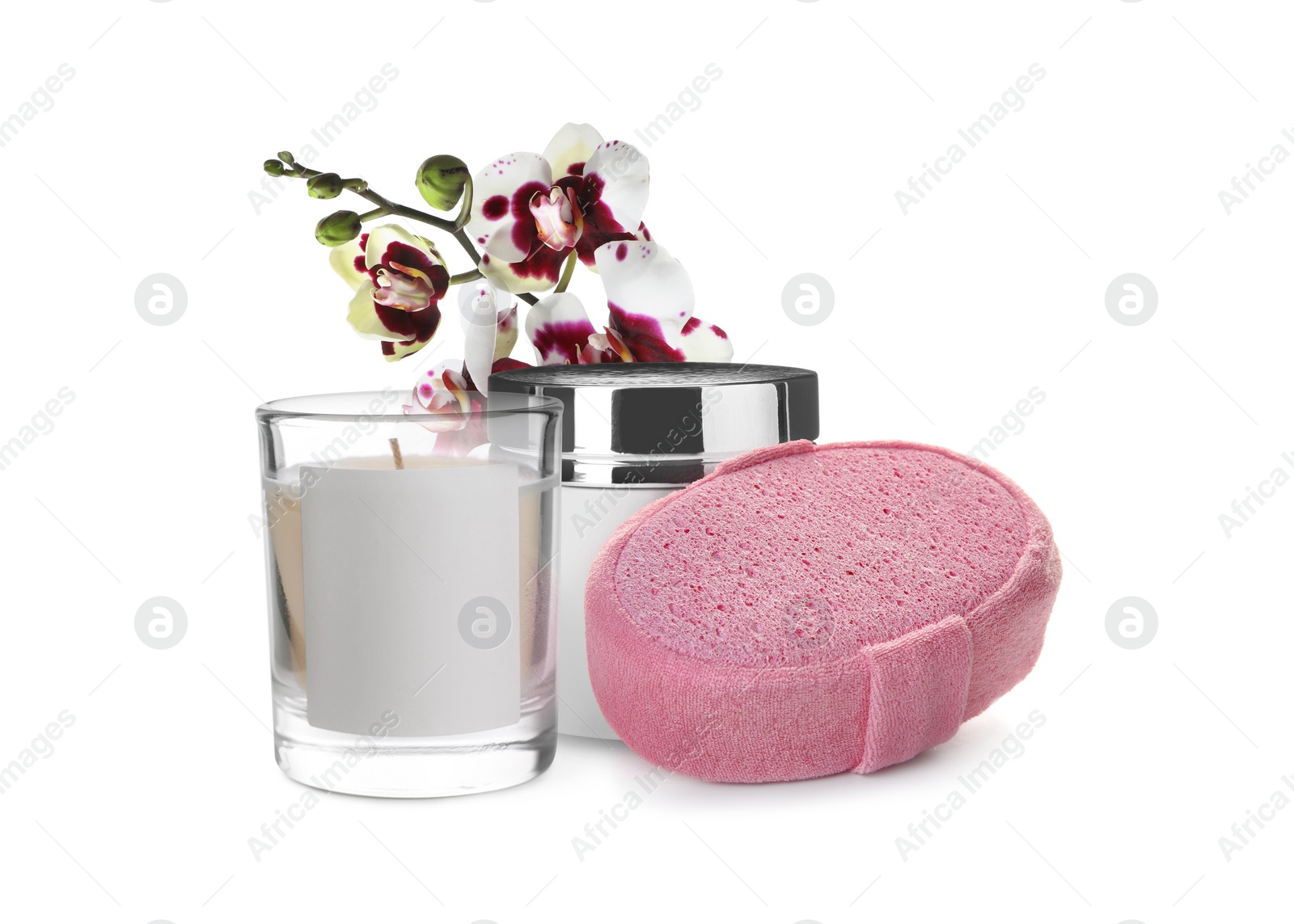 Image of Beautiful composition with shower sponge, candle and orchid flowers on white background. Spa therapy