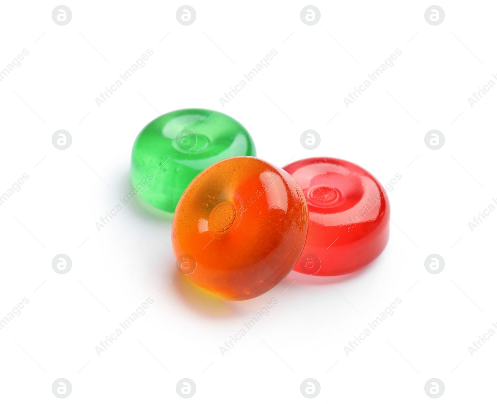 Photo of Different delicious colorful candies on white background