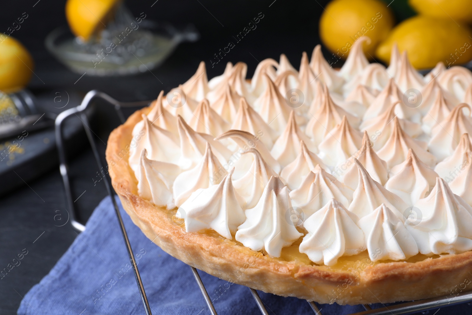 Photo of Delicious lemon meringue pie on table, closeup