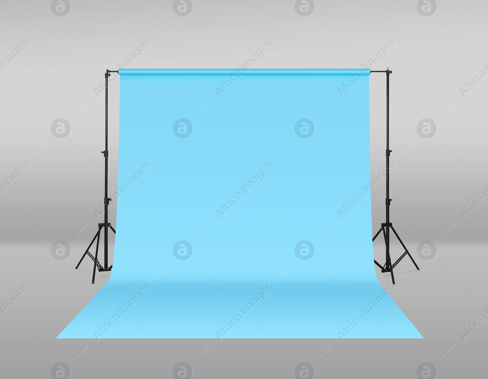 Image of Modern light blue photo background. Professional studio equipment