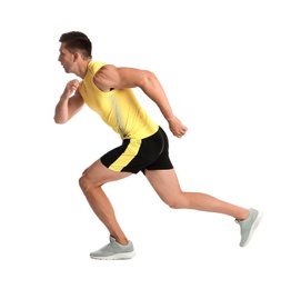 Sporty young man running on white background