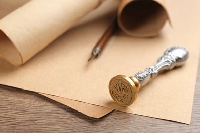 Notary's public pen and documents on wooden table, closeup