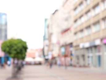 Blurred view of city street on sunny day