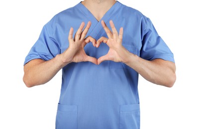 Photo of Doctor making heart with hands on white background, closeup