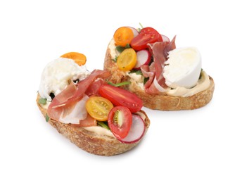 Photo of Delicious sandwiches with burrata cheese, ham, radish and tomatoes isolated on white