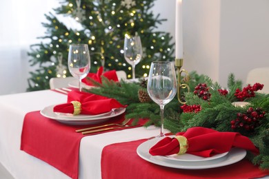 Beautiful table setting with Christmas decor indoors, space for text