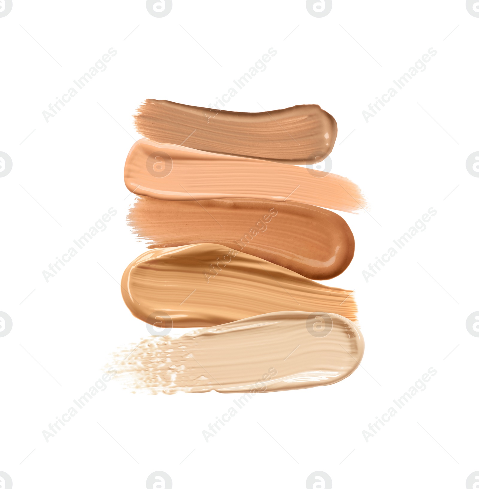 Image of Different shades of liquid skin foundation on white background, top view