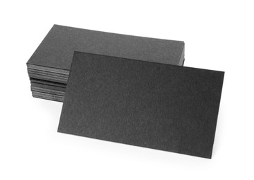 Many blank black business cards isolated on white. Mockup for design