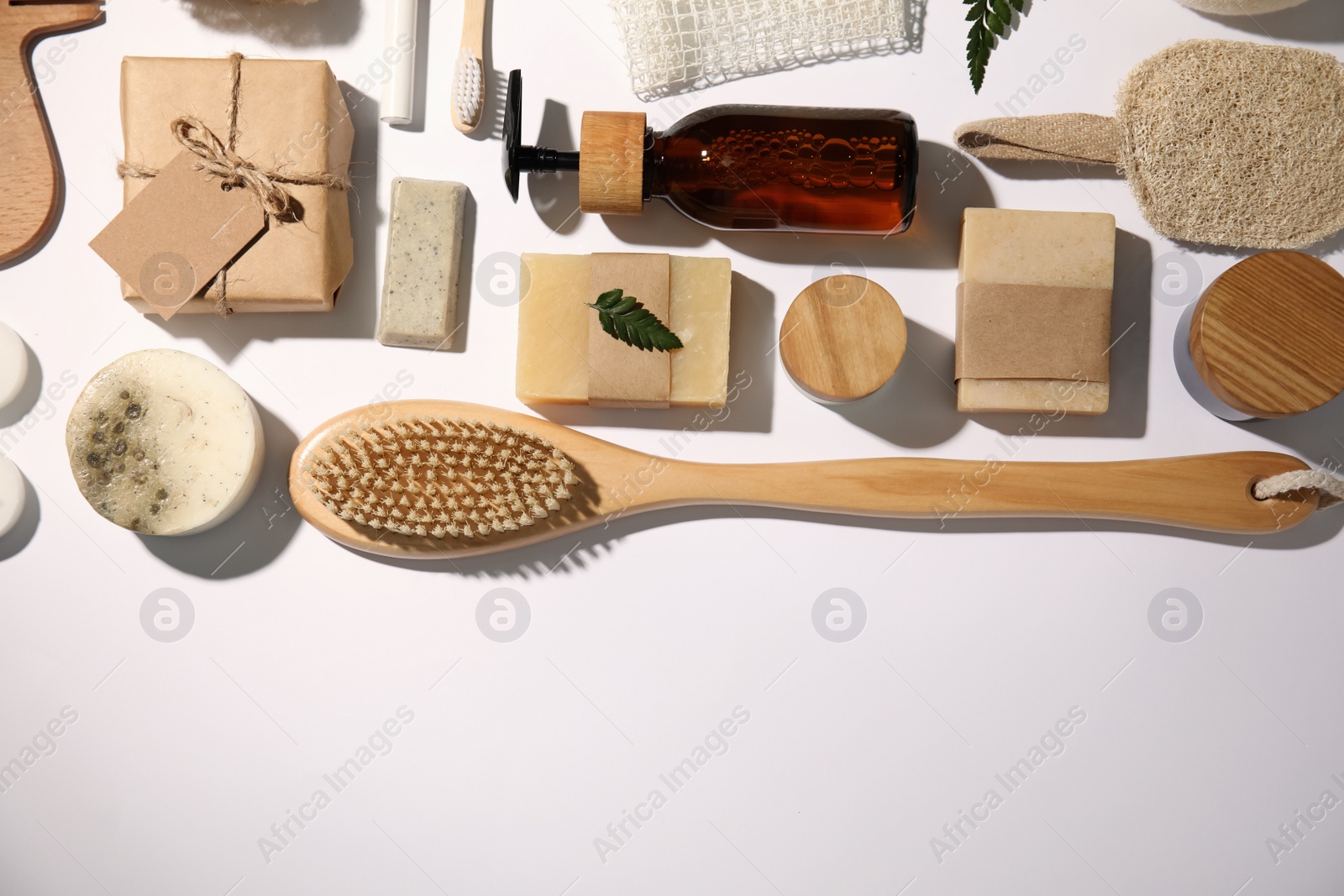 Photo of Flat lay composition with eco friendly personal care products on white background