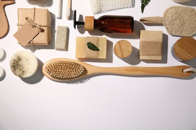 Flat lay composition with eco friendly personal care products on white background