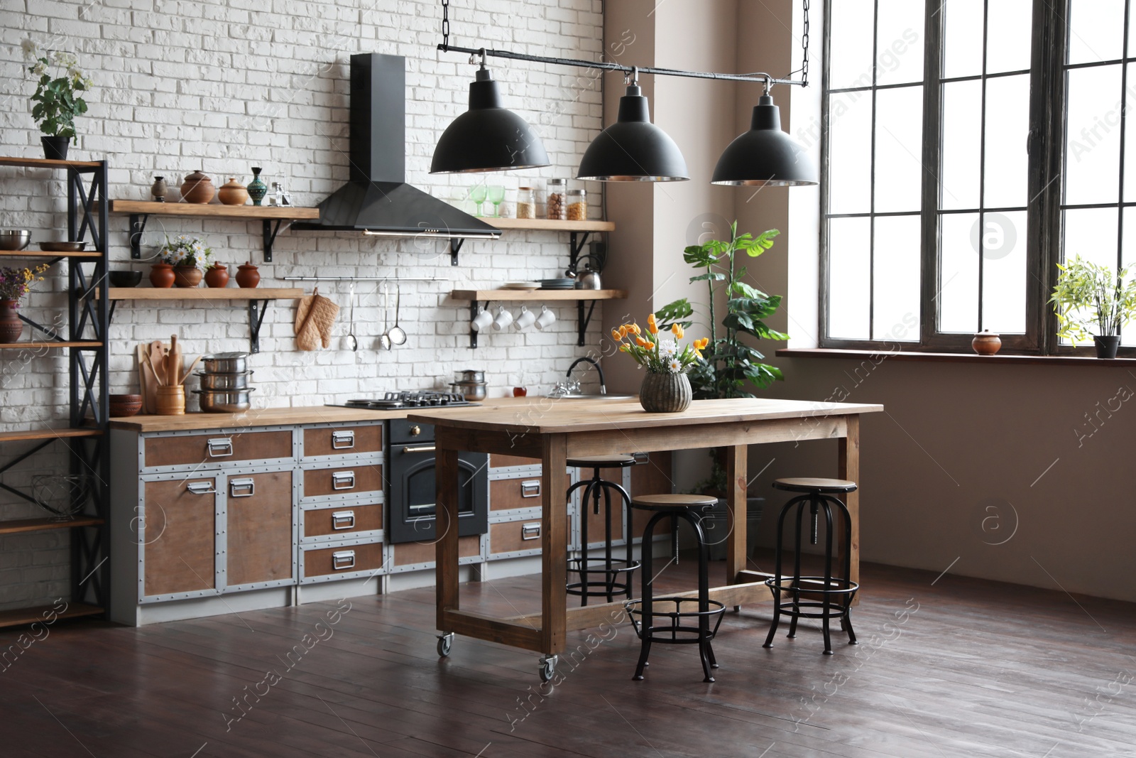 Photo of Beautiful kitchen interior with new stylish furniture